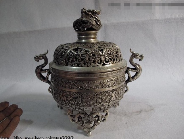 Name:  Tibetan-Buddhism-bronze-silver-lucky-foo-dog-Dragon-3-Leg-censer-incense-burner_jpg_640x640.jpg
Views: 359
Size:  85.3 KB