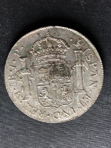 Name:  1817 Counterfeit 8 Reales reverse.jpeg
Views: 88
Size:  113.4 KB