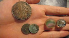 handful of crap-pink silver dollar obverse.jpg