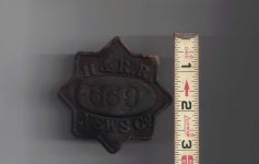 H & R R NEWS CO BADGE DETECTED 8 15 2013 WITH MEASURING TAPE resize.jpg
