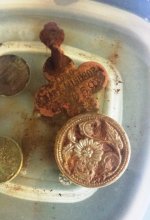 Oil cleaning button.jpg