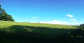 Blue sky and rolling hill.jpg