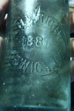 Wright bottle embossing 1.JPG