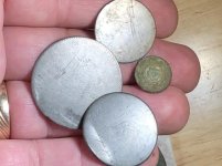 Tombacs and flower button.jpg