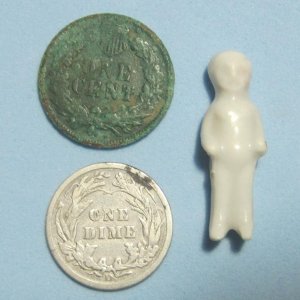 Frozen Charlotte doll (ca 1880).  Eyeball find in a cornfield where school was 1870-1943.