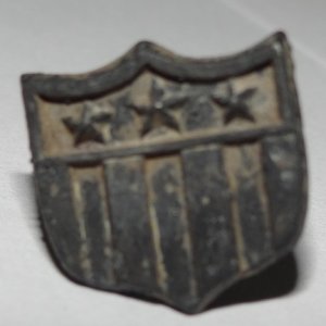 Actually this is a cuff button.  Rang up like a nickel.  Not sure how old?