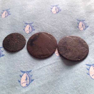 Blank Farthing, and 2 King George the 2nd half pennies (all found at cellar holes). The farthing and the middle king George 2 are from the same locati