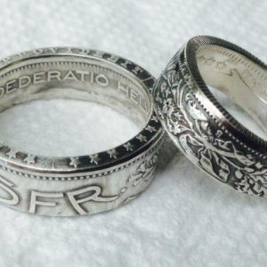 Mom and Dad's 60th wedding anniversary rings.  1953 5 and 2 Swiss Franc uncirculated coins.