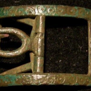 Young boys complete shoe buckle , its almost 1/3 smaller then the average size normally found . it has a "stamped" tooled design of round shapes with 