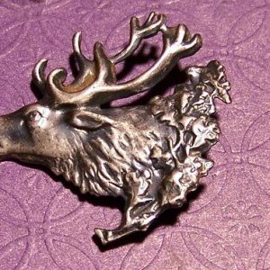 late 1800's to early 1900's silver brooch of an elk