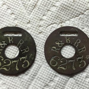 My second Rutland & Burlington RR luggage tag (on right) shown with original tag dug in 2015 (c. 1849-1869).