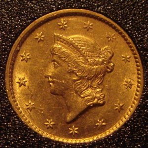 Obverse side of 1854 US Gold Dollar Type I. Found in Leesburg, Virginia at 9.5 inches with a Whites XLT and 950 coil