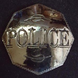 police badge cleaned