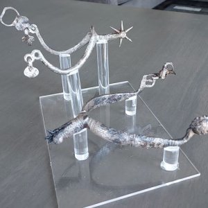 Acrylic stand I made to display 2 of my spurs