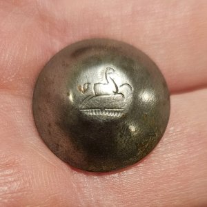 Domed tombac button with prancing horse design - 1700s