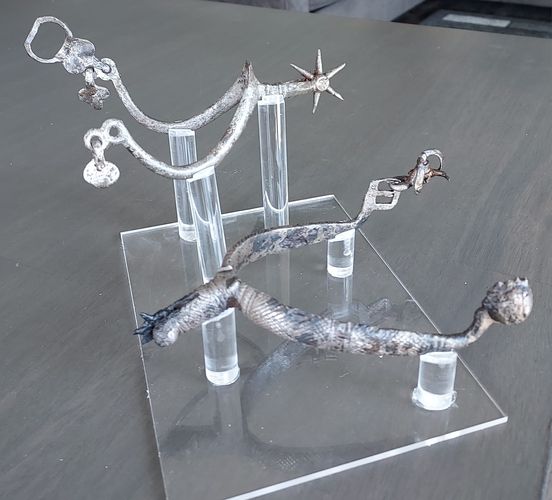 Acrylic stand I made to display 2 of my spurs