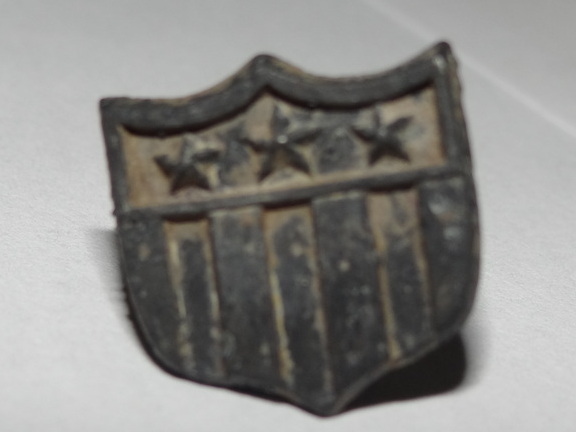 Actually this is a cuff button.  Rang up like a nickel.  Not sure how old?