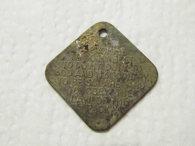 Back of Cub Scout Medal I found in my garden in 2013.
