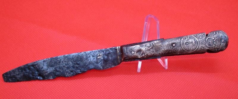 Fancy 1700s table knife with ornate copper scales showing 4 lions with rings in their mouths