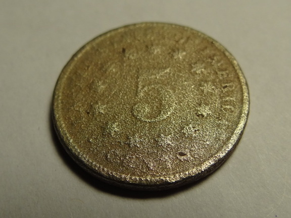 First and only shield nickel I've found.  Pretty Toasty.