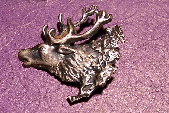 late 1800's to early 1900's silver brooch of an elk
