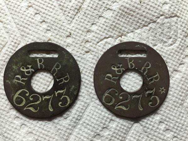 My second Rutland & Burlington RR luggage tag (on right) shown with original tag dug in 2015 (c. 1849-1869).