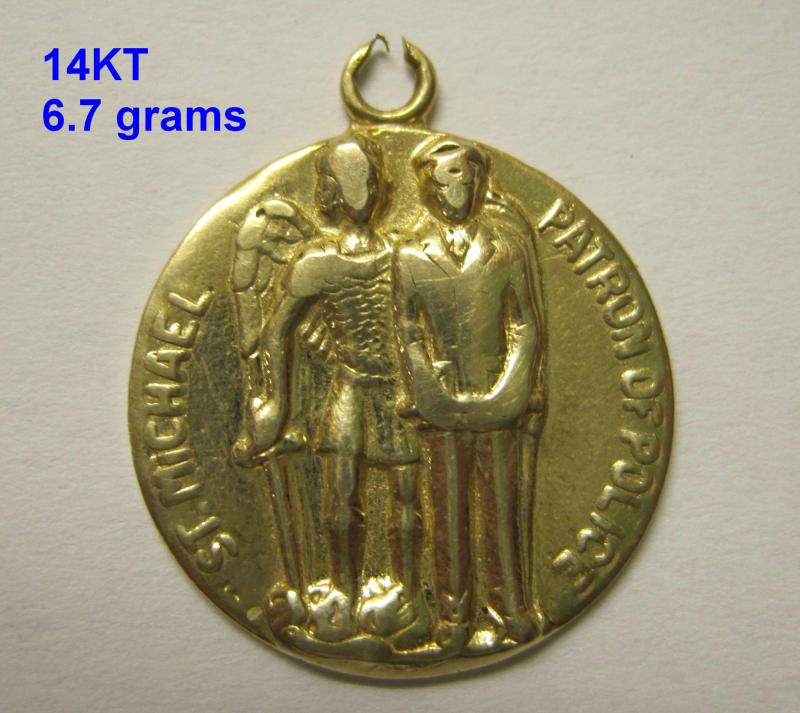 Nice chunk of gold.  Back is engraved with initials and date