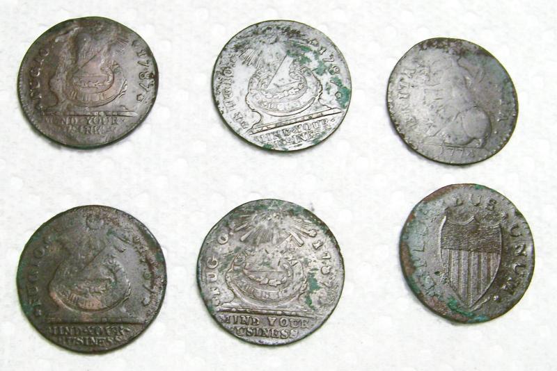 The 6 colonial coin spill after some initial cleaning